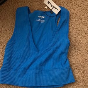 Selling Garage Stella seamless plunge tank top in the color French blue